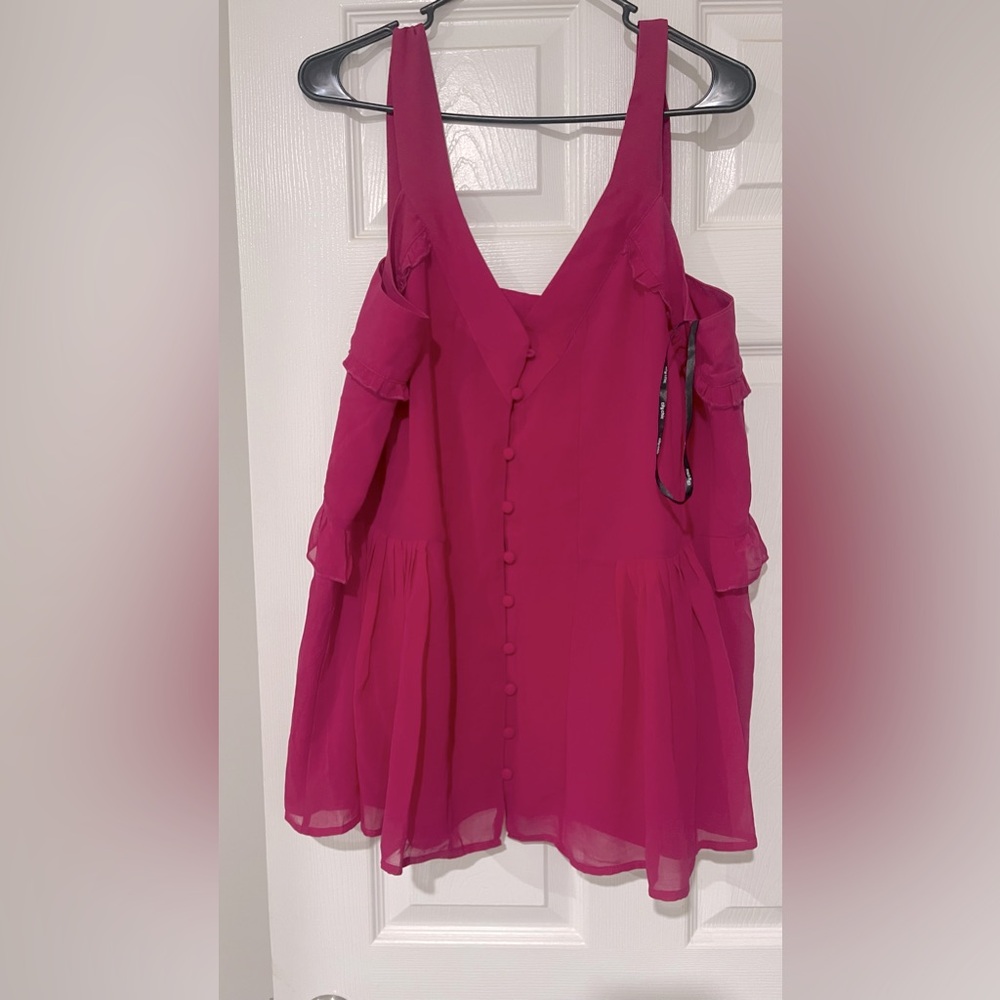 Fuschia sleeveless blouse with button detail